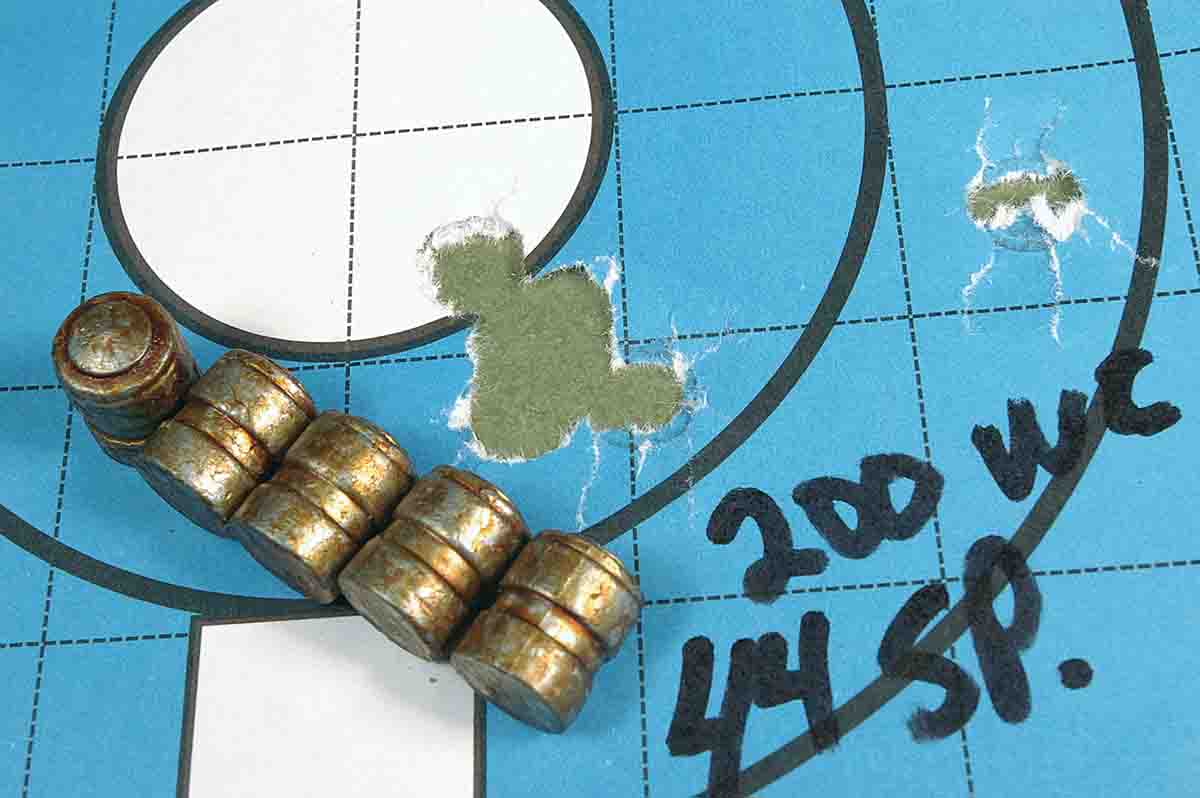 This five-shot group was fired at 25 yards from .44 Special cases loaded with 200-grain wadcutters and Unique. The hole on the right was from the first bullet fired.